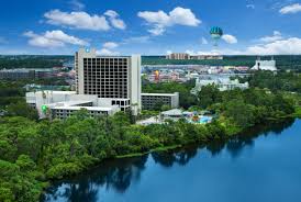 Lake Buena Vista, Florida's skyline. A mint green and navy blue hot air balloon is visible in the sky over the area. Lake Buena Vista, Florida is a location served by Johannessen Lights.